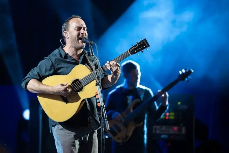 A photo of singer and guitarist Dave Matthews of Dave Matthews Band performing. Photo by Jim Houle.
