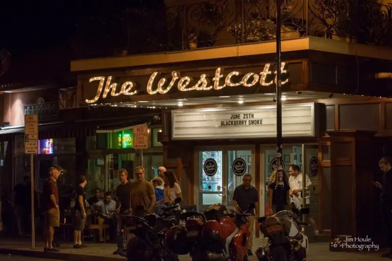 picture of the westcott theater from outside at night with people outside waiting to go inside