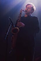 Supporting band member for Mild High Club playing saxophone