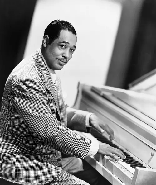 Duke Ellington plays the piano