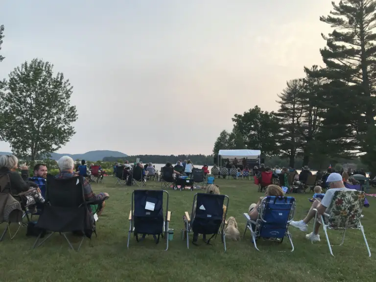 Audiences listen in for Music on the Point on the shores of Lake Pleasant