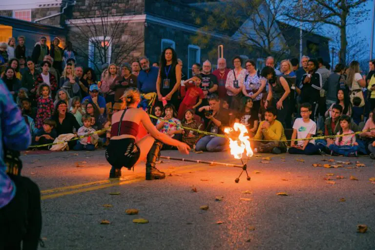 Beacon Bonfire Music and Arts Festival
Performer squats while juggling torches in front of a crowd
Photo Credit: Austin Ruffer