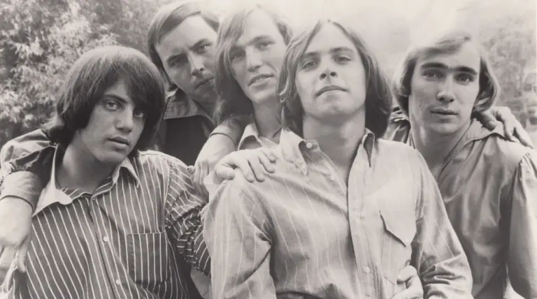 black and white photo of the members of the hassles