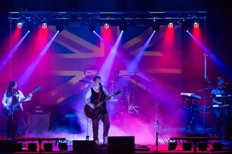 anthony casuccio playing on stage with guitar