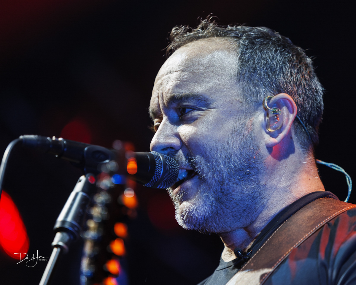 Dave Matthews at the mic onstage at SPAC 2025.