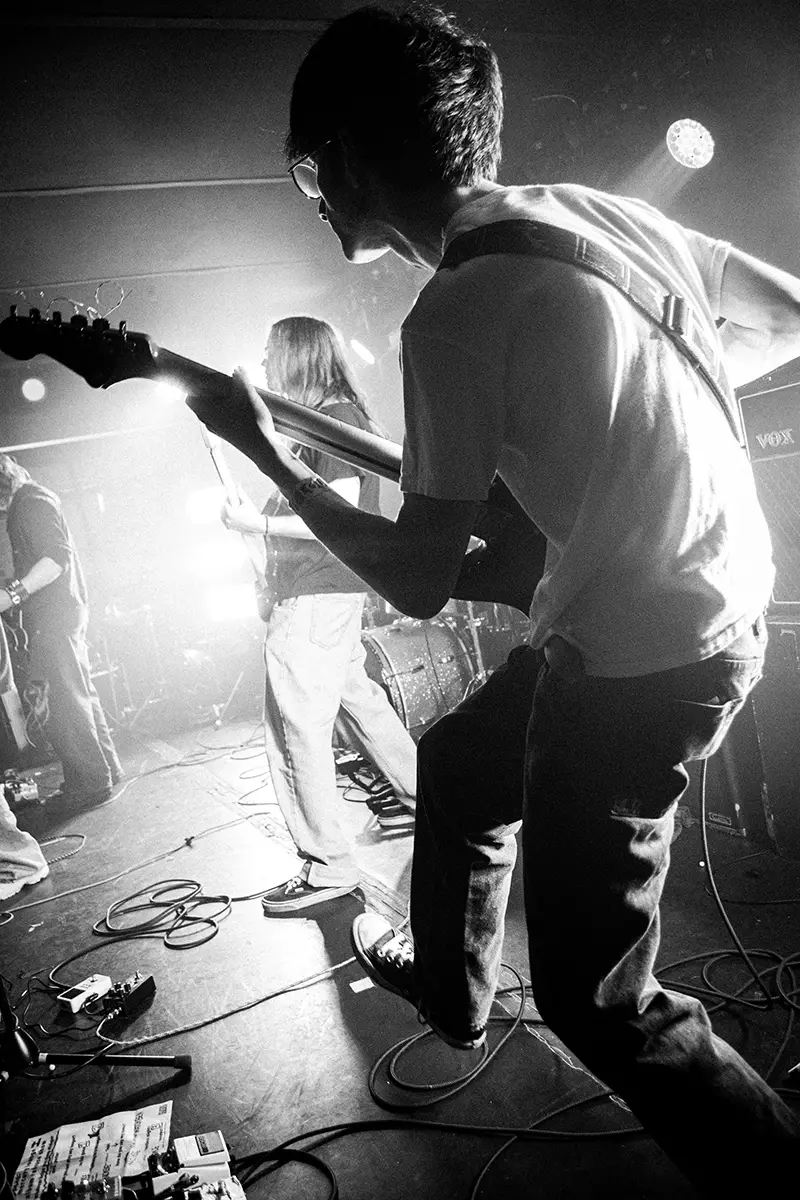 charlie playing the electric guitar at mercury lounge