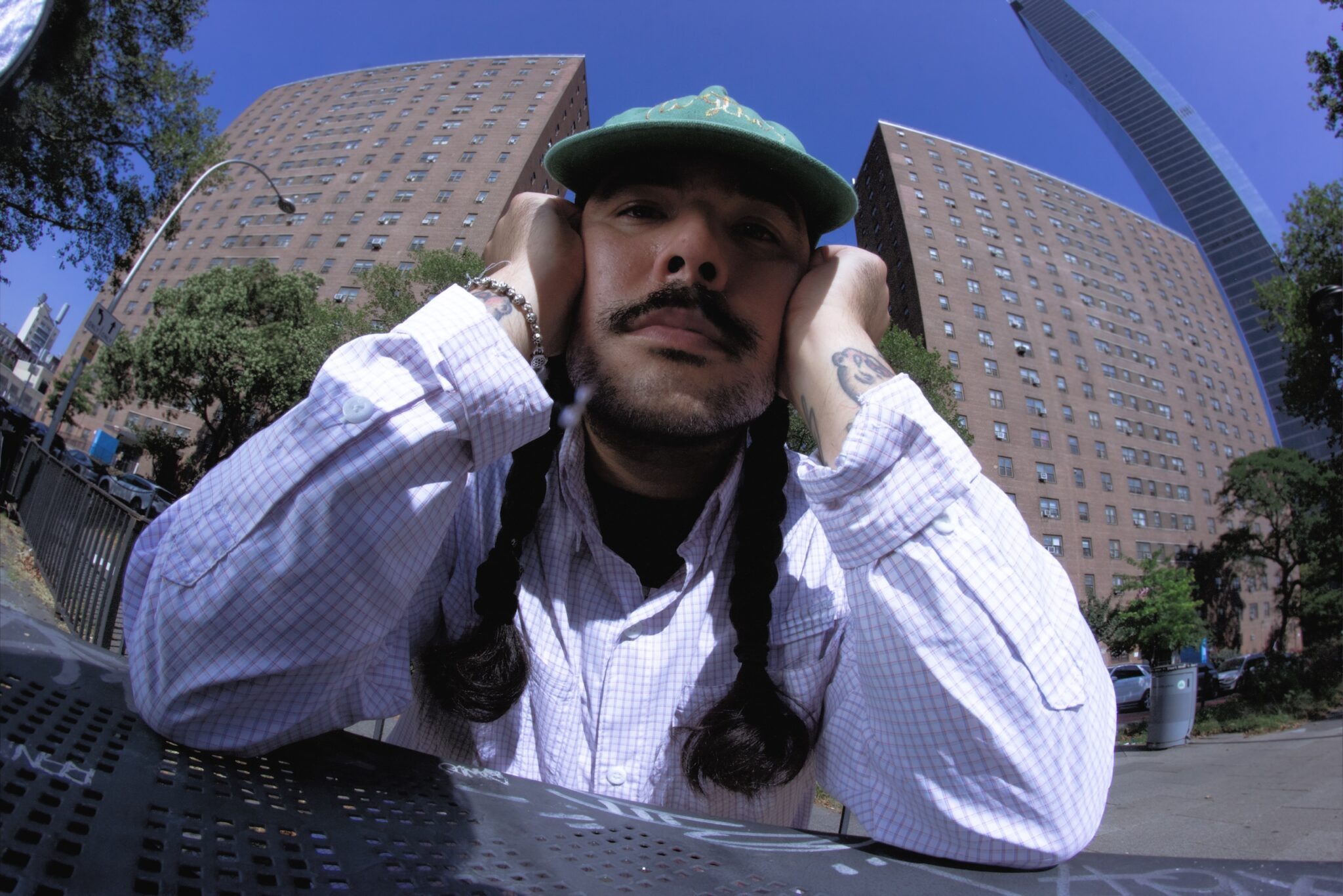 Glom (Sean Duvennant) at a park table