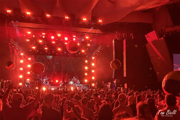 Giant beach balls fill the air while Train takes the stage at SPAC